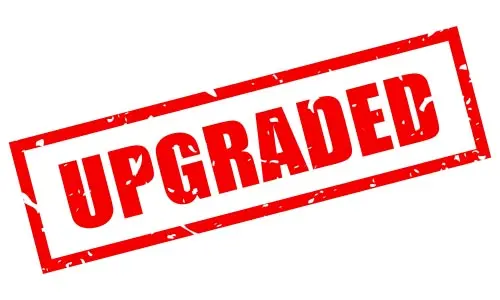 A red “Upgraded” stamp, isolated on a white background